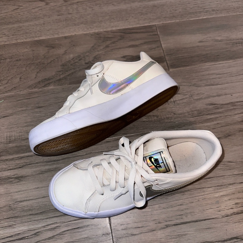 Women’s white Nike running shoes sneakers